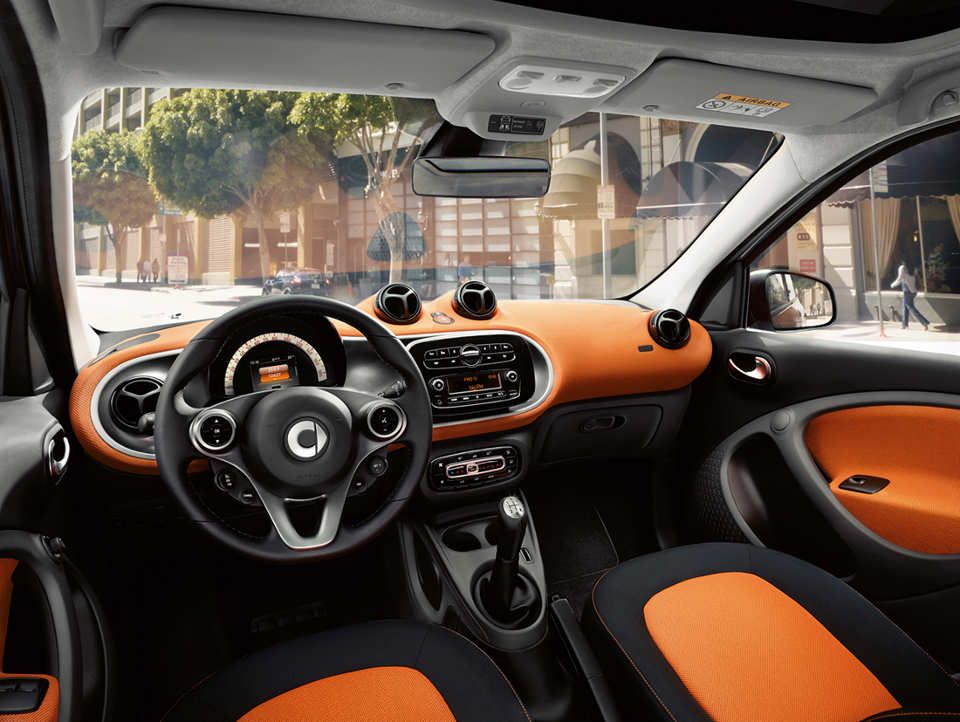 detail shot: passion and edition 1#, dashboard and door centre panels in orange fabric, accent trim parts in black/grey and seats with black/orange fabric upholstery, 3-spoke multifunction steering wheel in leather copyright: full buyout